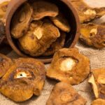 Dried mushrooms with some in a basket