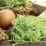 Edamame noodles next to an egg