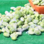Frozen edamame on a blue background