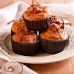 Banana oatmeal breakfast muffins on a white plate