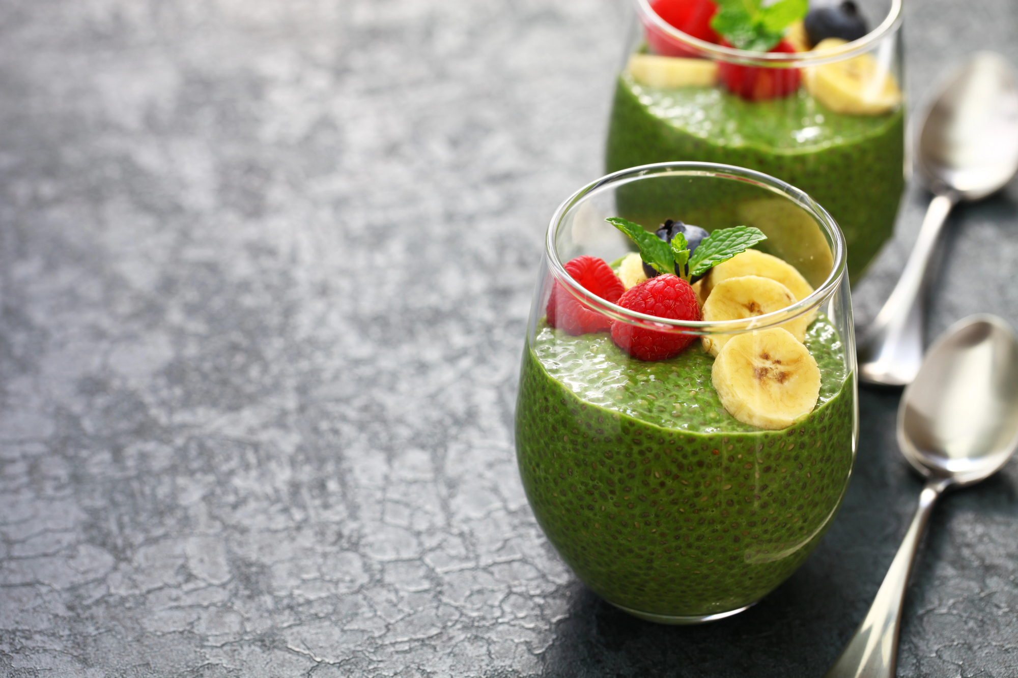 Energizing matcha chia seed pudding with two glasses
