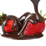 Frozen chocolate-covered strawberries with chocolate pouring on top